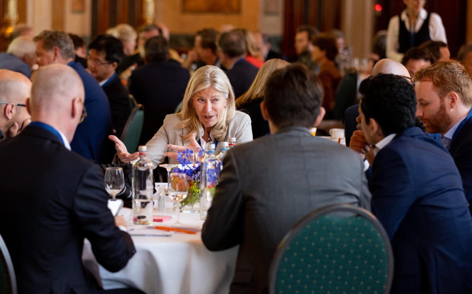 Energy professionals having a roundtable discussion at an energy event