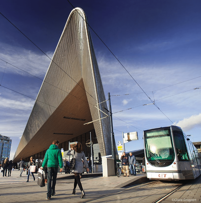 A tram in Rotterdam city centre pulls into a station